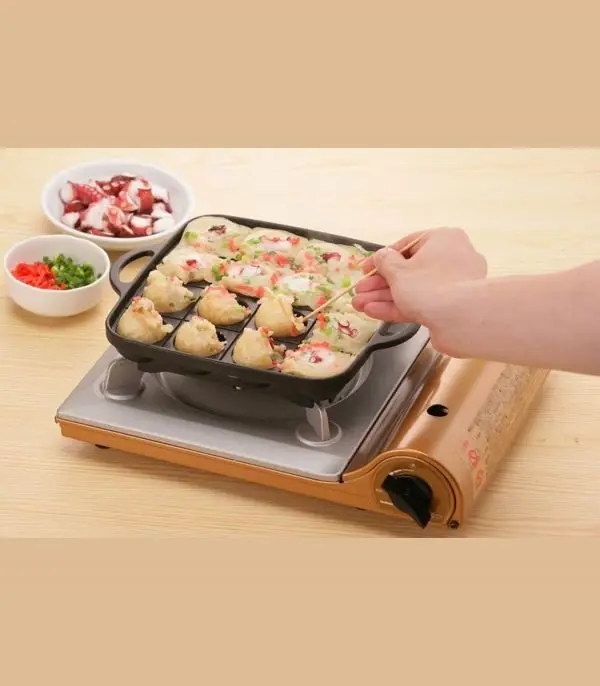 ⁦جريل تحضير التاكوياكي⁩ - الصورة ⁦4⁩